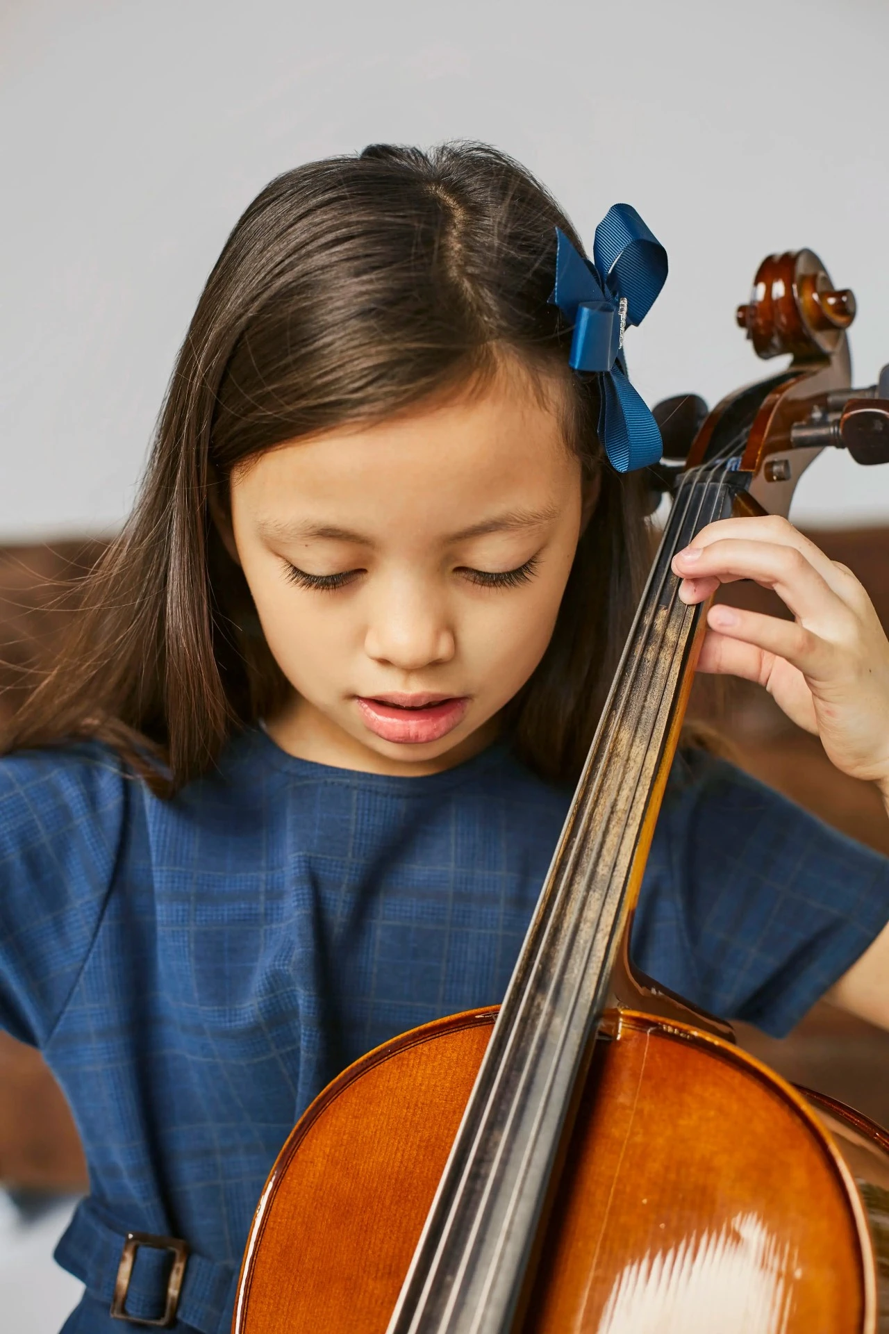 young-cute-girl-learning-how-play-cello